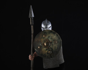 male knight in chain mail with a spear