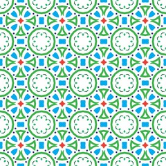 Seamless geometric pattern with blue, green, and red shapes creating a symmetrical design.