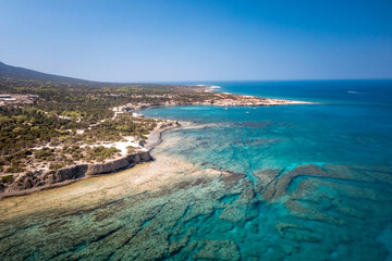 Turquoise water meeting green coastline. Blue Lagoon, Latchi, Paphos District, Cyprus