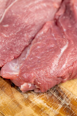 a piece of raw pork before cooking