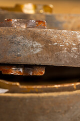 an old rusty brake disc from the car's brake system