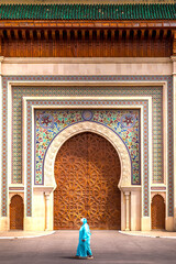 Fez, Morocco - March 23, 2024: Brass gate and zellige mosaic tilework on Dar al-Makhzen or Dar el-Makhzen royal palace in Fez, Morocco