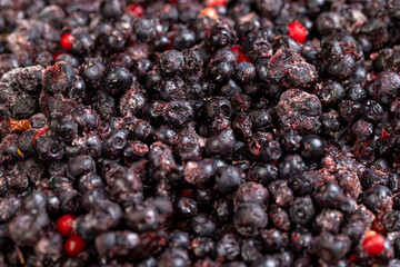 various blueberries after freezing are on the table