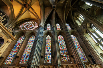 Fototapeta premium The Rose Window and stained glass window panels in the nave of the medieval Durham Cathedral Church of Christ in Durham, England UK.