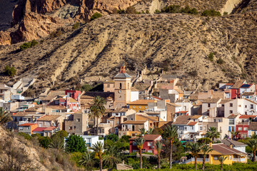 View of the town of Ulea in the Ricote Valley in the region of Murcia, Spain, with the church tower...