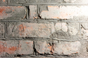 Old red brickwork close-up. Ancient red brick wall