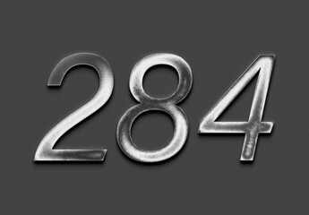 Chrome metal 3D number design of 284 on grey background.