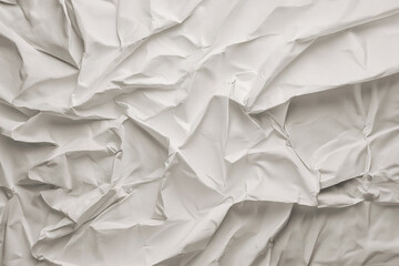 Obraz premium Wrinkled paper texture background, White crumpled and creased paper texture background.