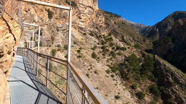 Hiking trail to Colgante bridge (Puente Colgante El Saltillo) over Almanchares river, Sierra Tejeda, Andalusia, Spain