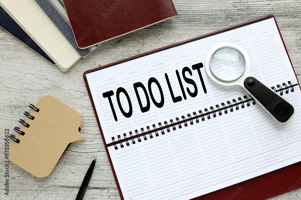Poster to do list text on a white page of a diary on the table