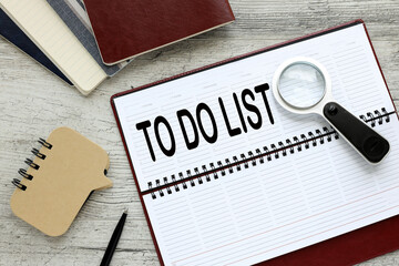 to do list text on a white page of a diary on the table
