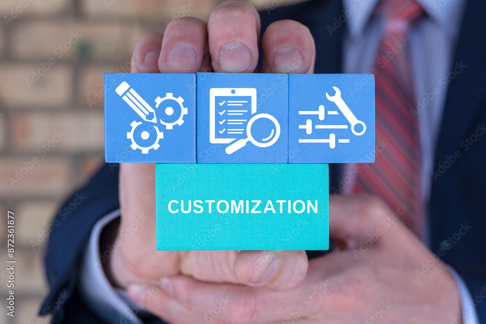 Poster business man holding styrofoam blocks with icons sees word: customization. concept of customization 