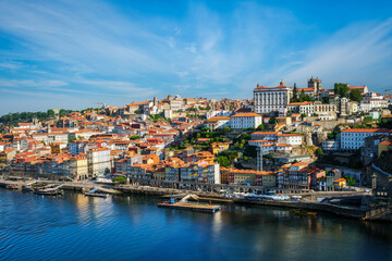 View of Porto city and Douro river from famous tourist viewpoint Miradouro da Serra do Pilar on sunset. Porto, Vila Nova de Gaia, Portugal