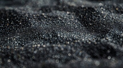 Serene Beauty of Black Sand Grains: Close-up of Smooth and Untouched Surface Texture