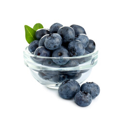 Glass bowl with fresh blueberries on white background