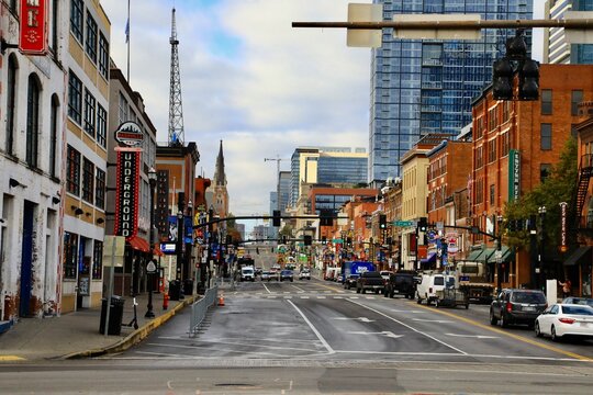 Popular Lower Broadway & Honky Tonk district - iconic country Music bars & restaurants on Broadway avenue. Nashville, Tennessee, USA - May 22
