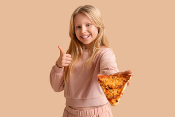 Cute little girl with tasty pizza showing thumb-up gesture on color background