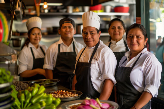 Guatemala professional service staff, salesperson and cook in modern restaurant.	
