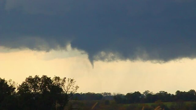 Tornado dissipates under a thunderstorm near Hamilton Missouri on October 24 2021