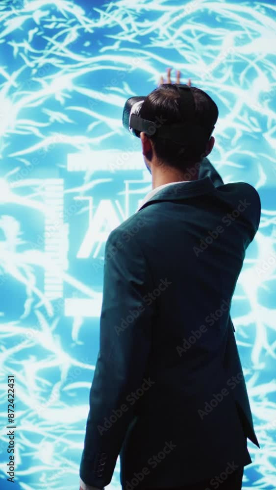 Poster vertical video computer scientist wearing vr headset looking at hologram of artificial intelligence 