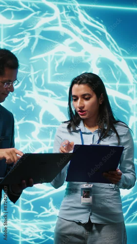 Poster vertical video ai researcher and coworker working with artificial intelligence neural networks. comp