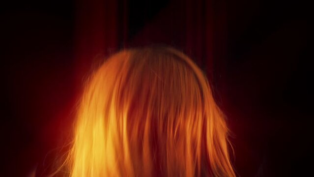 Rock Fan Shaking Head In Colorful Glows