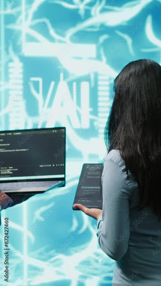 Poster vertical video team of admins using tablet and laptop to maintenance artificial intelligence neural 