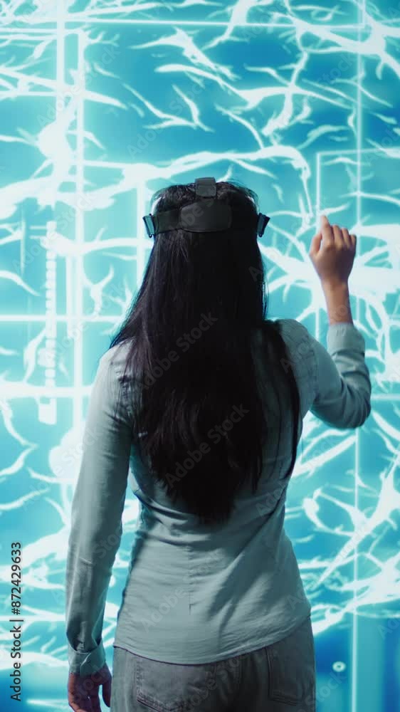 Poster vertical video engineers use vr headset and ai neural networks modeled after human brain to solve co