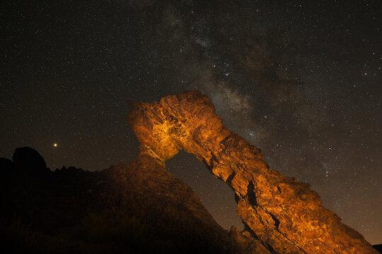 Lighted Zapato de La Reina, The Queen's Shoe with Starry Sky, Milky Way, New Moon Night Shoot, Las Ca&ntilde;adas, Teide National Park, Tenerife, Canary Islands, Spain, Europe