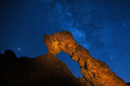 Lighted Zapato de La Reina, The Queen's Shoe with Starry Sky, Milky Way, New Moon Night Shoot, Las Ca&ntilde;adas, Teide National Park, Tenerife, Canary Islands, Spain, Europe