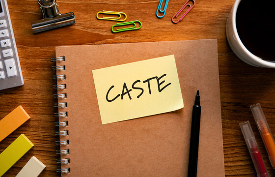 There is sticky note with the word CASTE. It is as an eye-catching image.
