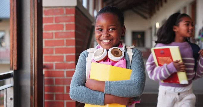 Face, girl and smile with book in outdoor for learning, education and development as student in school. Female child, headphones and learner for growth, skills and scholarship in literacy or numeracy