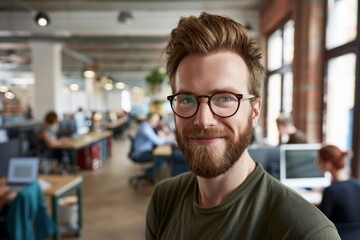 Obraz premium Beaming Man in Creative Office - Positive Energy, Professional Environment, Joyful Expression
