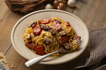 Spaghetti pasta with mushrooms and bacon.
Image of delicious pasta.