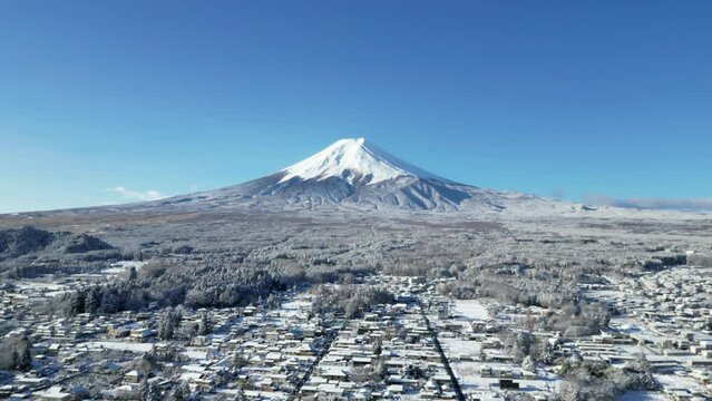Aerial drone 4k video view of Mount Fuji covered in snow