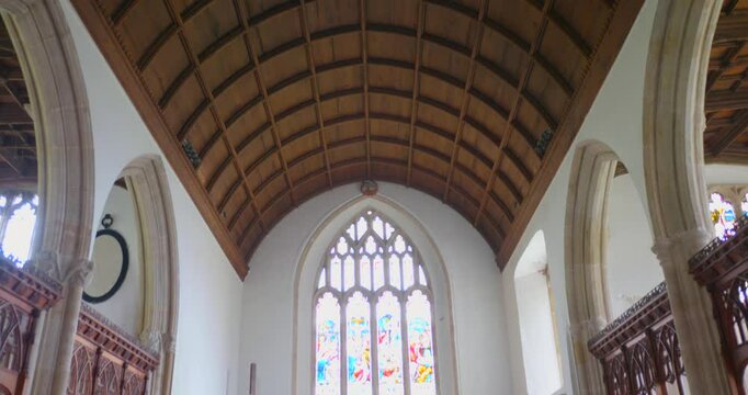 Tilt down shot of interior of St John Baptist Axbridge church, situated in one corner of the medieval square in Axbridge, England.
