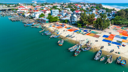 Lang Co Bay, Hue, Vietnam in the morning with a small fishing village peacefully below. It has beautiful lagoons