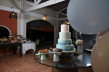 party room, birthday cake,table decoration, reception table, cake and sweet table, theme party, birthday party, cake with sea shells, maritime theme, 15th birthday party, 
a lot of balloons 