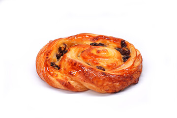 Fototapeta premium Pain aux raisins isolate on white, also called escargot or pain russe, is a spiral pastry often eaten for breakfast in France. Its names translate as 