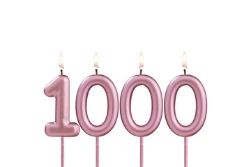 Lit birthday candle - Candle number 1000 on white background