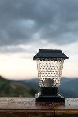 Black classic lamp with a mountain view. Beautiful view