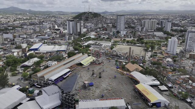Drone orbits around empty Patio de Eventos Luiz Gonzaga in the early afternoon during Sao Joao festival in Caruaru, Brazil