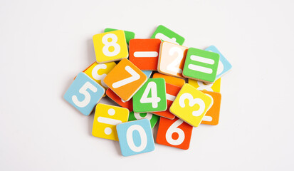 Number wood block cubes for learning Mathematic, education math concept.