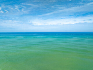 Obraz premium Aerial view of amazing sea surface water texture background,Beautiful sky clouds background