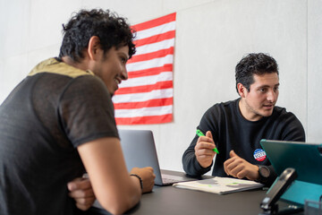 hispanic man register for vote, the polling worker giving a vote button, register queue for election in us