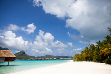 Overwater bungalows in Bora Bora lagoon, French Polynesia