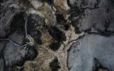 cracked concrete wall covered with gray cement surface as background, rack concrete white wall or Cement wall background, Broken hole in white wall. Abstract background.
