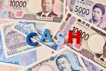 たくさんの新紙幣とキャッシュの文字