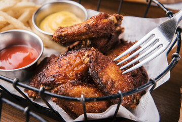 a grilled chicken wing in korean food 치킨 윙 구이 