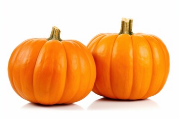 Obraz premium Two Fresh Pumpkins Isolated on White